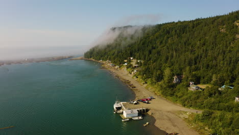 Cinematic-aerial-view-of-the-Atlantic-coastline-as-mist-rises-up-the-cliffs-on-Grand-Manan-Island