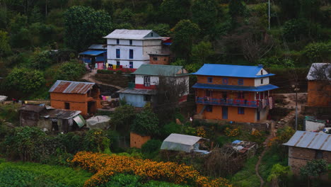 Drone-shot-of-Nepal-village-landscape,-Traditional-housings,-farms,-and-beauty-4K