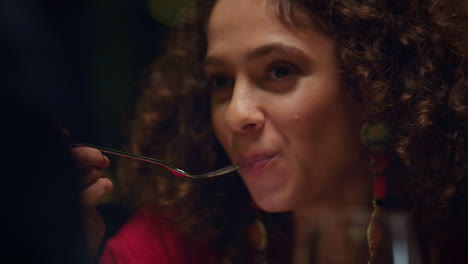 african american woman eating enjoying delicious dessert culinary in restaurant.