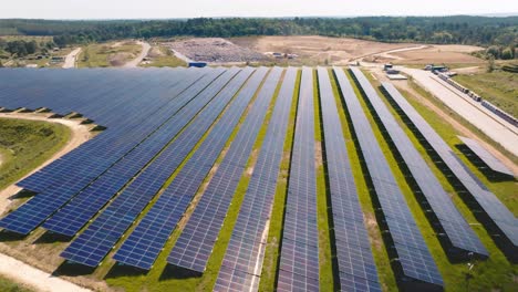 solar panels at very low altitude, slow lateral drone shot