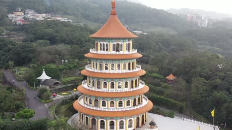 dolly out view of the temple - experiencing the taiwanese culture of the spectacular five-stories pagaoda tiered tower tiantan at wuji tianyuan temple at tamsui district taiwan