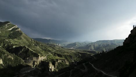 mountain valley landscape with dramatic cloudscape