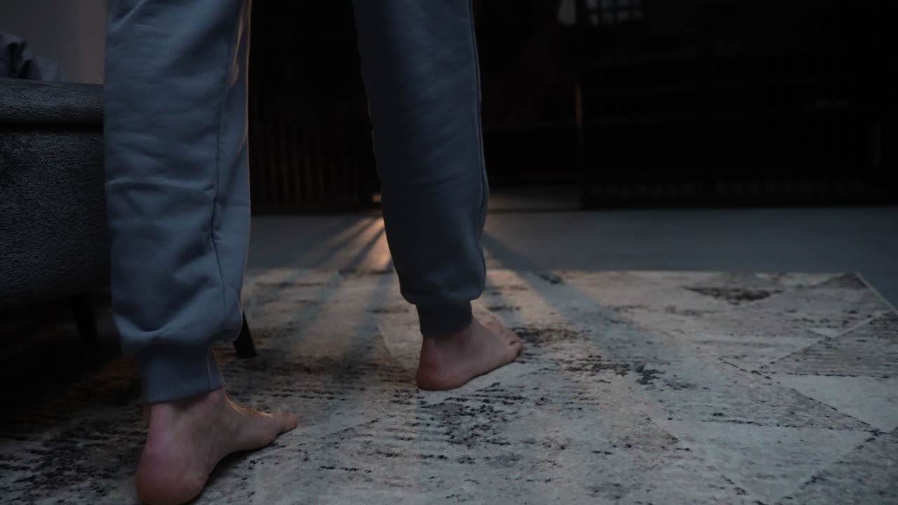 Closeup of man's feet on the floor