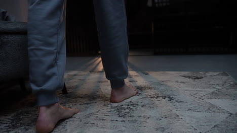 closeup of man's feet on the floor