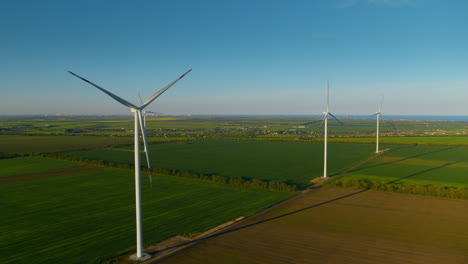 view of progressive wind turbines generating environmental friendly electricity.