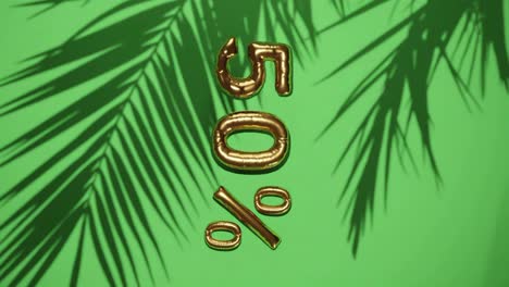 50% discount sale on green background with palm tree gentle breeze, holiday summer sale concept special price offers online store vertical