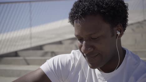 Closeup-shot-of-African-American-man-with-earphones.