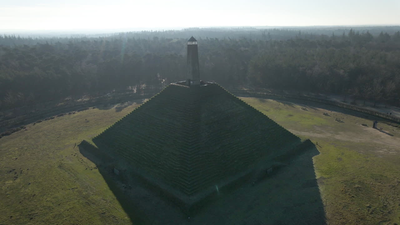 Jib up of Austerlitz Pyramid in the Netherlands on a sunny day. The Piramide van Austerlitz is a monument in the Netherlands, built in 1804 as a tribute to Napoleon Bonaparte.