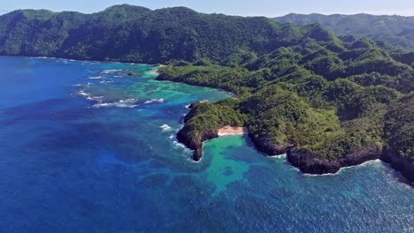 Dramatic-spectacular-aerial-view-of-Dominican-Republic-coastline-on-sunny-day