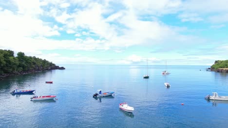 Anchored-sailboats-in-Anse-a-la-Barque-bay-in-vieux-habitants,-Guadeloupe