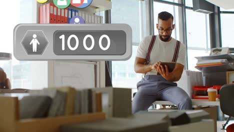 man using tablet inside office