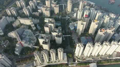 Hong-Kong-Butterfly-beach-area-skyscrapers-and-Ocean-walk,-low-angle-aerial-view