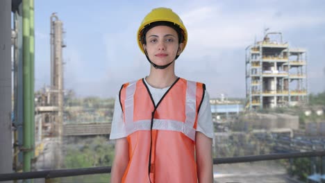 indian female construction worker looking at the camera