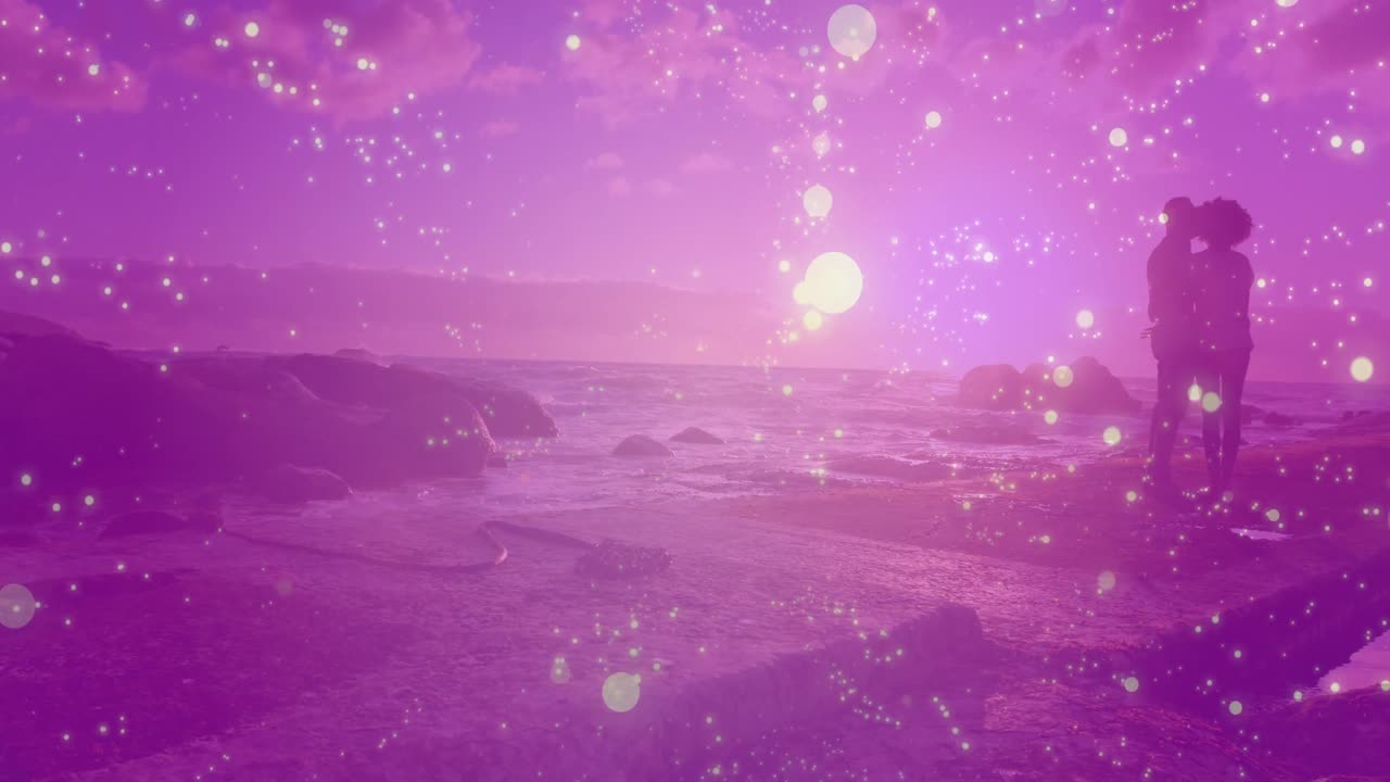 ⁇ 안고 있는 아프리카계 미국인 부부 위에 빛의 반점이 그려진 애니메이션