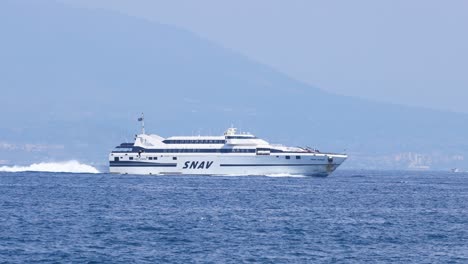 a ferry travels across the sea near sorrento