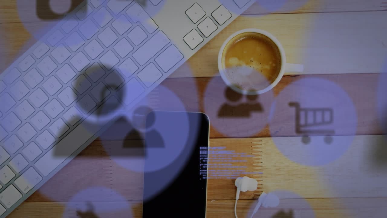 Animation of icons and data processing over computer keyboard, coffee and smartphone on desk