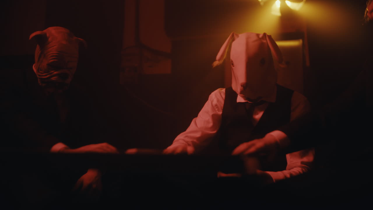 Masked Men Playing Cards in a Dimly Lit Room