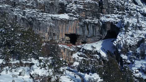 Aerial-view-of-rocky-mountain-with-caves-all-around