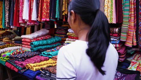 colorful market scene with woman shopping