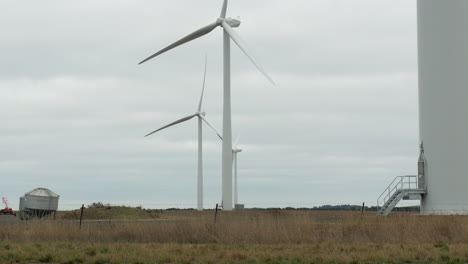 Wind-turbines-on-Australian-farmland.-PAN-UP-SHOT
