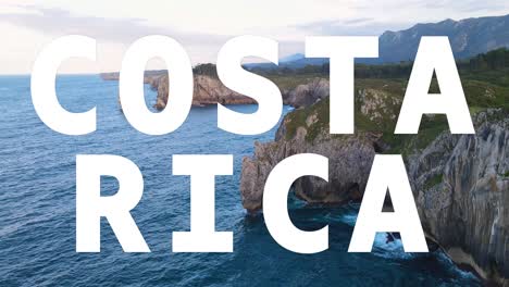 drone shot of island coastline with ocean overlaid with animated graphic spelling out costa rica