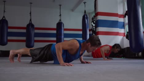 Caucasian-men-working-out-in-boxing-gym