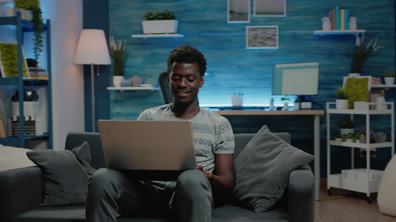 Corporate employee doing online remote work on laptop