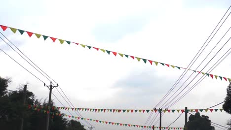 the street covered with flags and costume during the rufael day, christianity holiday in ethiopia