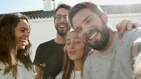 cheerful stylish young people talking to camera