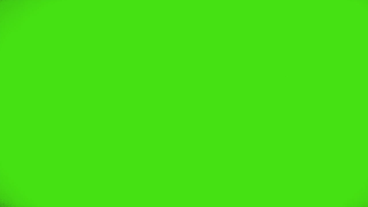 Close Up Silhouette Of Businessman Looking At Mobile Phone Walking Across Frame Against Green Screen Background