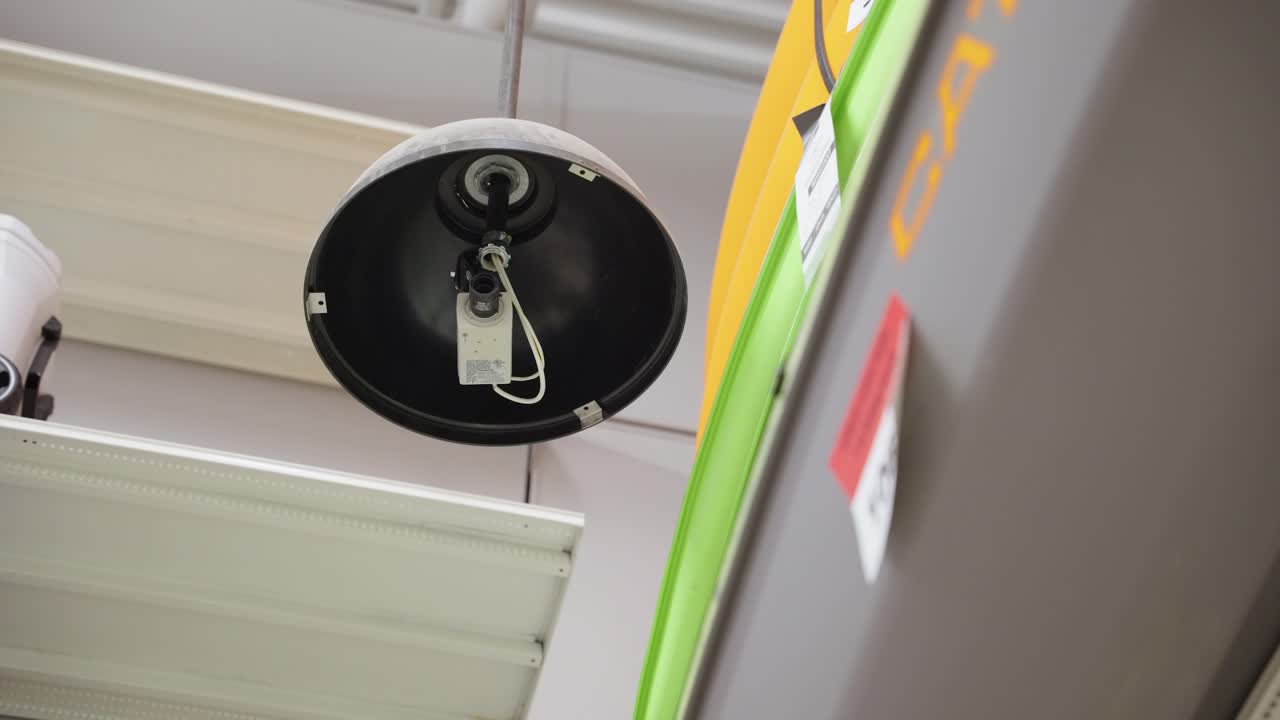 A close up of industrial machinery light, mechanical details in operation