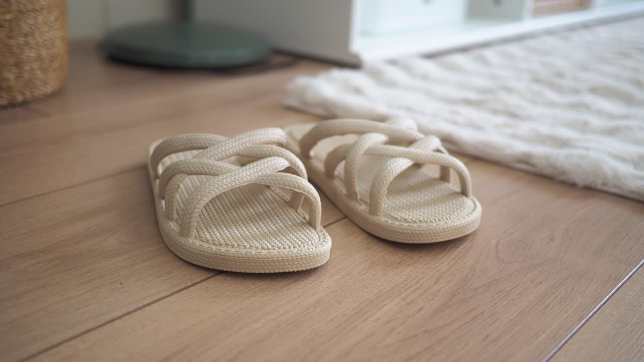 Slippers on Wooden Floor