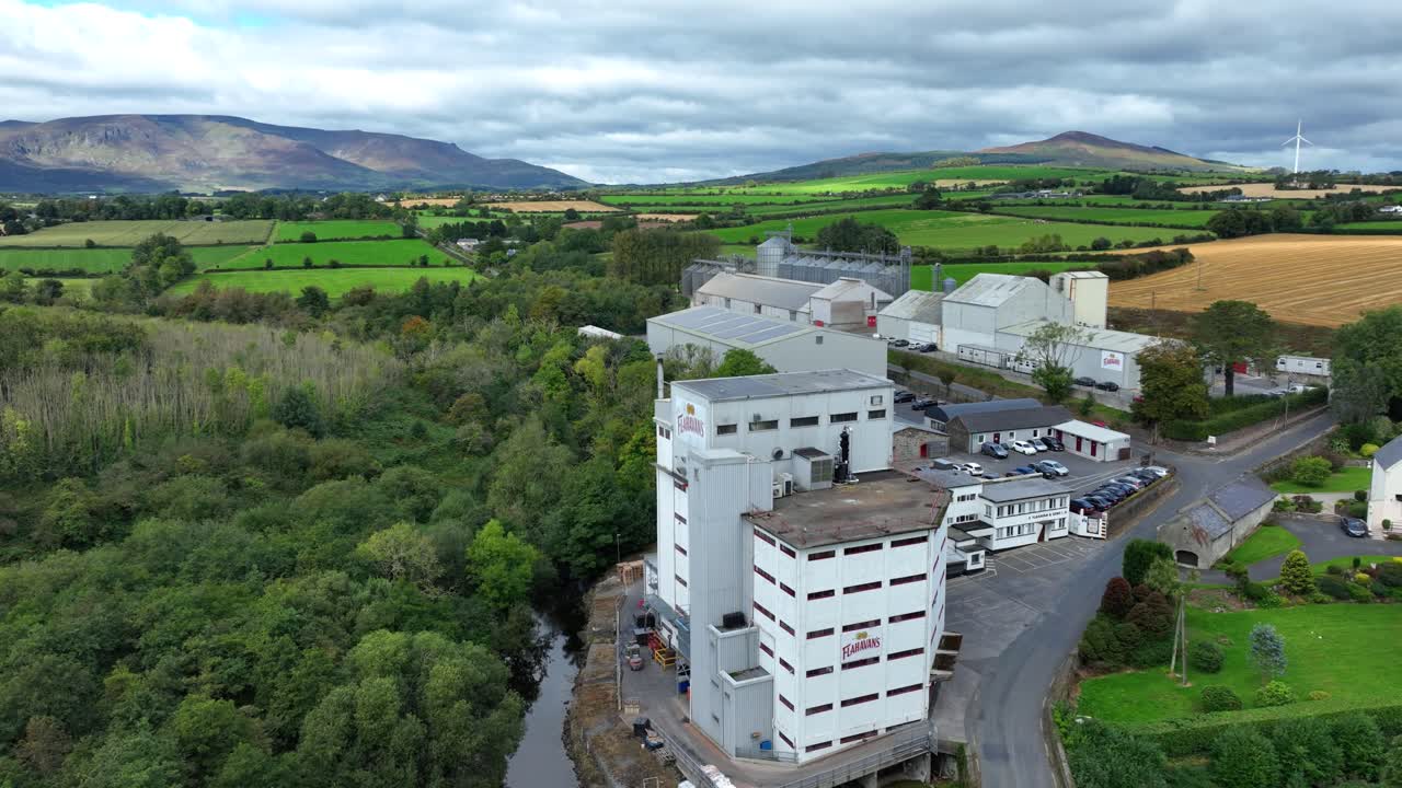 Ireland Epic Locations drone circling mill at Kilmacthomas co. Waterford Ireland with Comeragh Mountains in Background