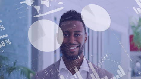 Statistical-data-processing-against-portrait-of-african-american-man-smiling