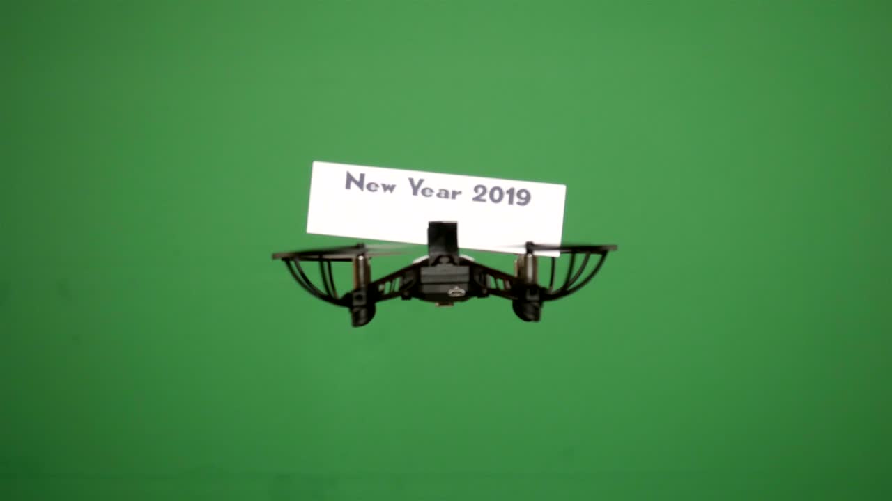 mensaje entregado por avión no tripulado: saludos de la temporada en una pantalla verde