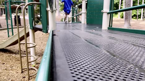 toddler running on playground at high point city lake park