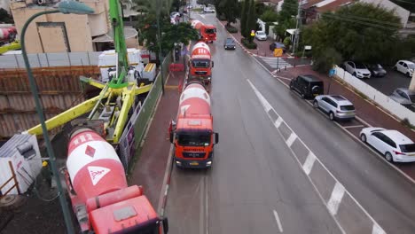 Concrete-mixer-mixing-cement-on-building-construction-site,-Tel-Aviv,-Israel