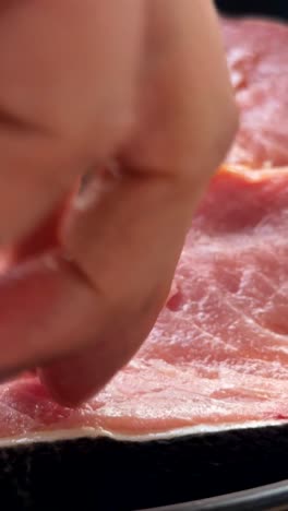 close-up of raw fish fillets being prepared