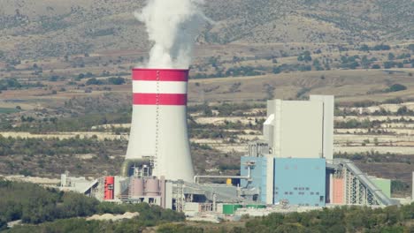 Coal-fired-power-station-plant-Smoke-Steam-Chimney-sunny-day-Clear-sky-close-up