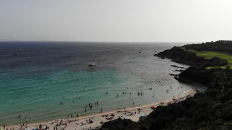 Drone-flies-over-Grande-sperone-beach-in-Corsica-island-starting-from-the-Coast-to-the-foreshore