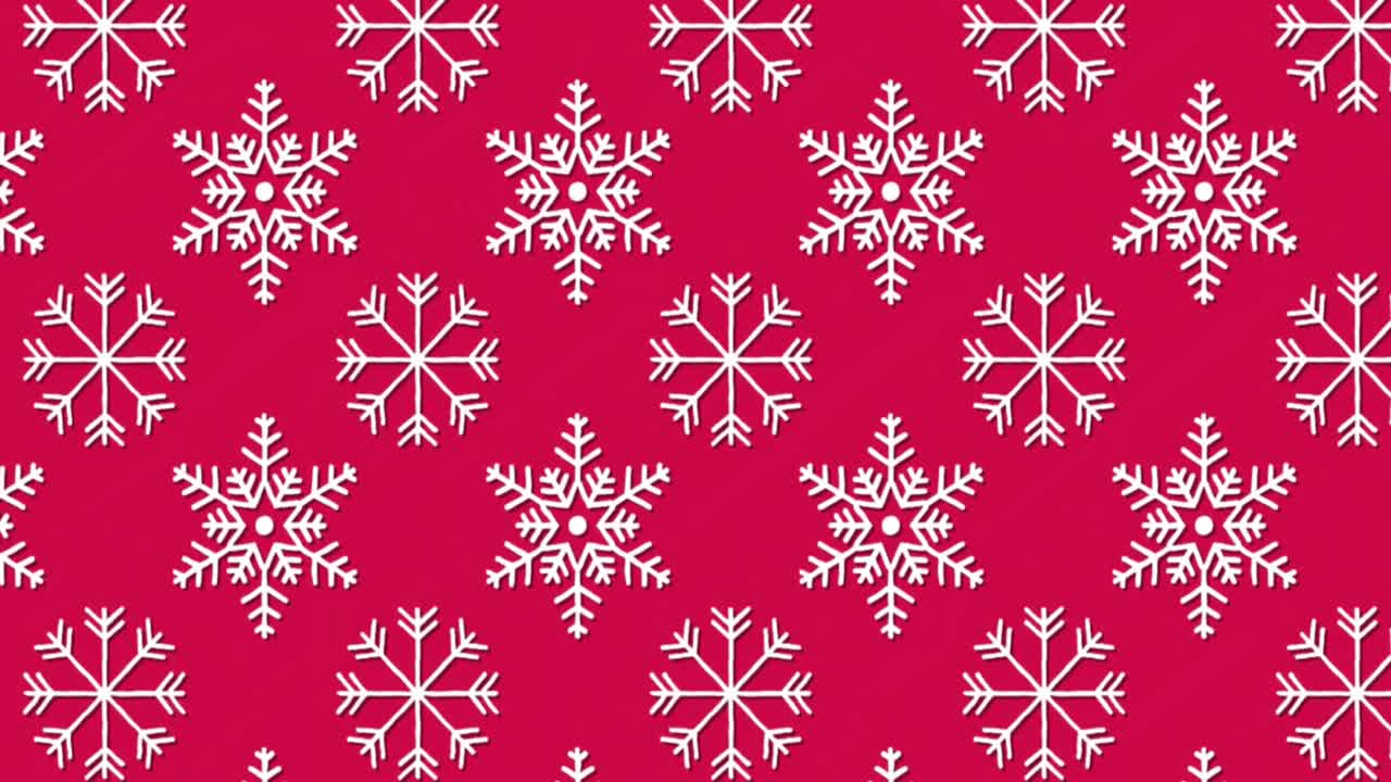 Animation of snowflakes pattern on red background