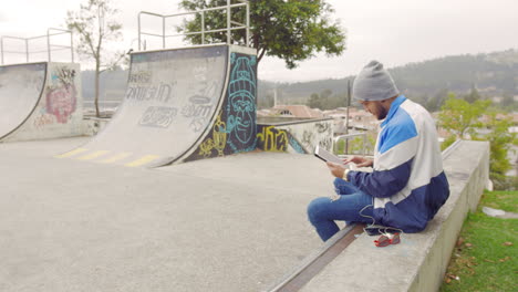 young-boy-using-tablet-outdoors