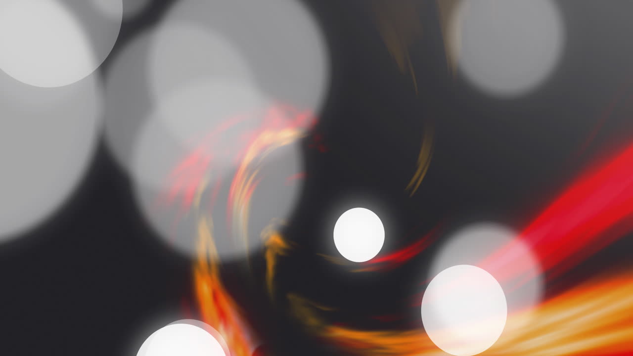 Animation of glowing light spots and light trials moving over black background