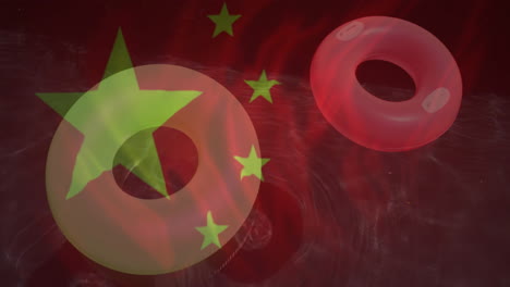 chinese flag with stars over animation of floating rings in water