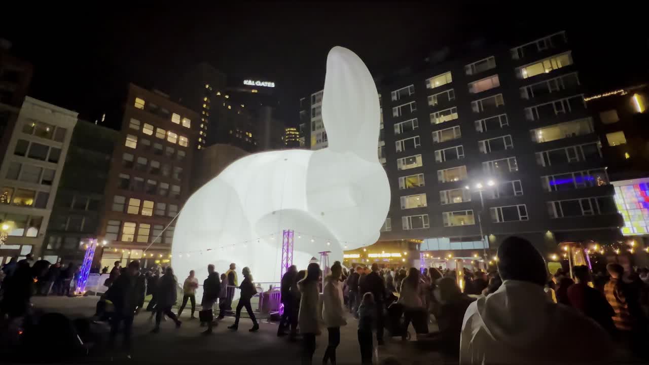 A giant 50 foot rabbit in downtown Pittsburgh for the city's First Night celebrations. Pittsburgh downtown market square during Christmas holiday season