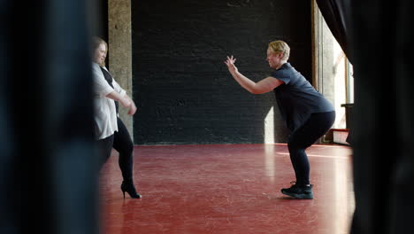 women dancing indoors