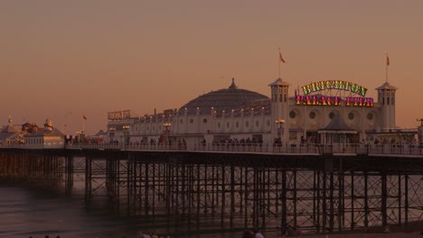 the famous and amazing brighton pier at a sunny late summer afternoon