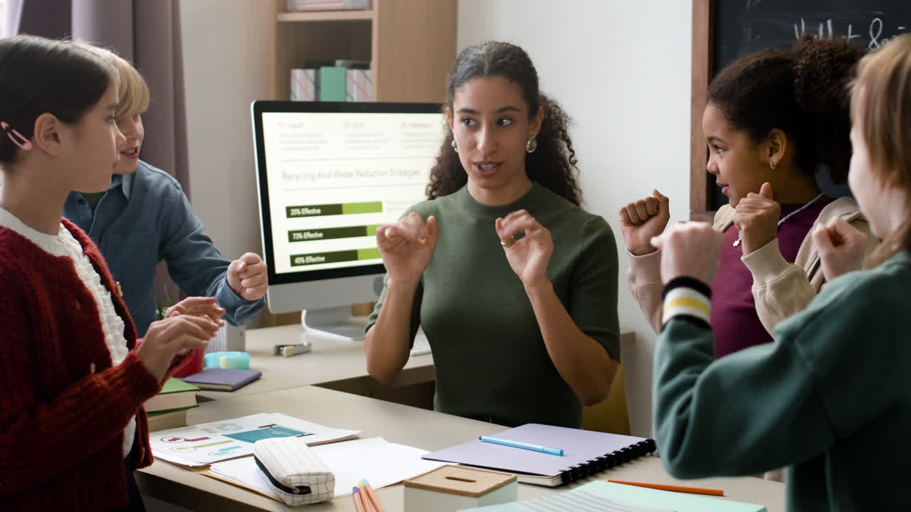 Students Engaging in Classroom Activity with Teacher