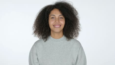 young african woman heart sign by hand, white background