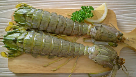 fresh-mantis-shrimp-with-lemon-on-wood-board